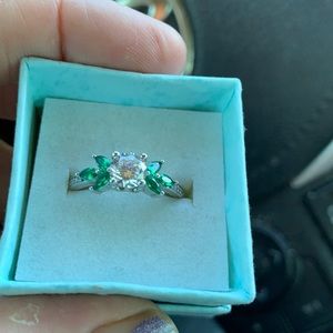 New sterling silver dipped in rhodium clear stone with green stones